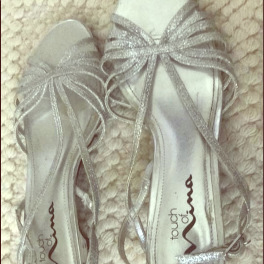 Woman’s silver dress sandals size 6 1/2.